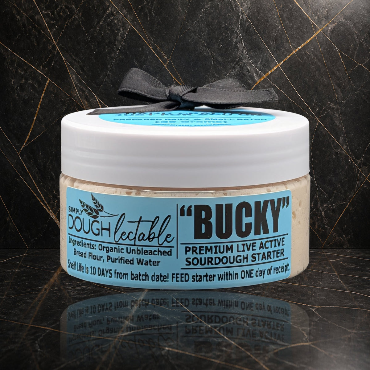 Bucky Live 35g active sourdough starter jar on marble